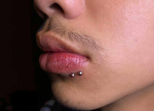 Spider Bite Piercing Guide: Pain, Healing Time  Aftercare